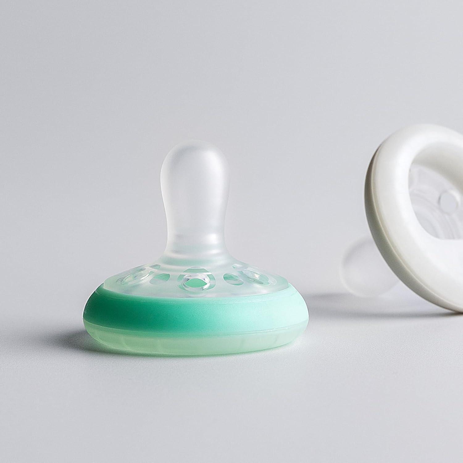 image:imageTommee Tippee BreastLike Night Newborn Pacifier 06 Months BreastLike Baglet BPAFree Binkies Glow in The Dark Technology TealBlue Pack of 2