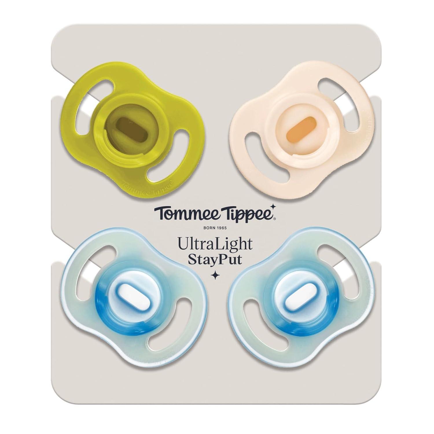 image:imageTommee Tippee Stay Put Pacifier Set Contains 2 UltraLight StayPut Glow in The Dark Pacifiers and 2 UltraLight StayPut Pacifiers 618 Months Colors May Vary OnePiece Silicone Design Pack of 4Blue Yellow