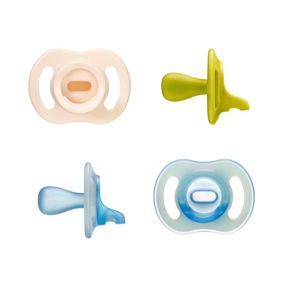 image:imageTommee Tippee Stay Put Pacifier Set Contains 2 UltraLight StayPut Glow in The Dark Pacifiers and 2 UltraLight StayPut Pacifiers 618 Months Colors May Vary OnePiece Silicone Design Pack of 4Blue Yellow